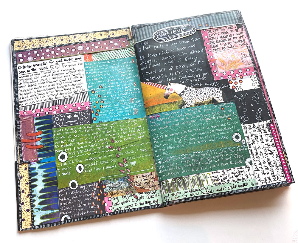 image of art journal with multiple sections of writing